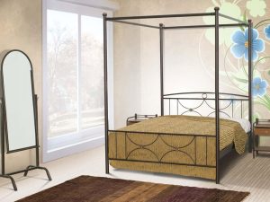 Κρεβάτι κατασκευασμένο με λεπτή μεταλλική δομή, διαχρονικό σχεδιασμό και ανθεκτική κατασκευή για μακροχρόνια στήριξη και σταθερότητα.